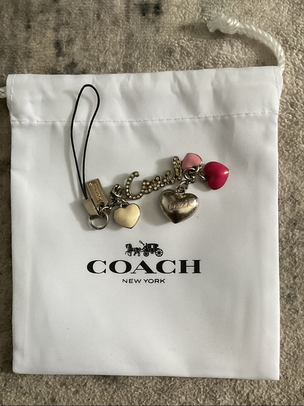 Coach Gold Tone Heart Charm Strap with Pink and Red Hearts
